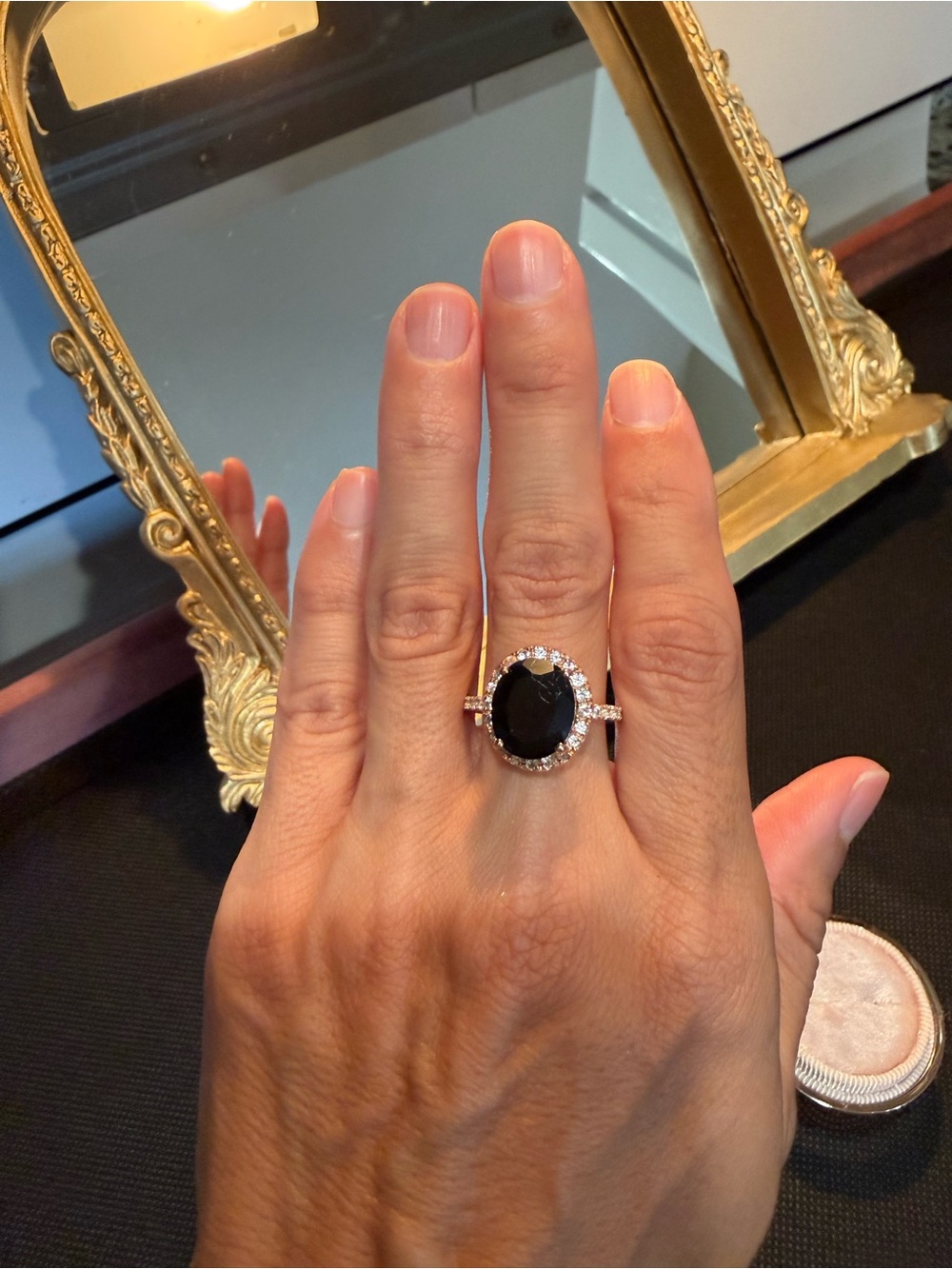 Black Onyx Halo Ring with white topaz accents